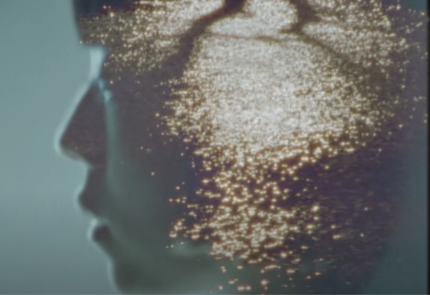 image of the sea reflected in the head of girl